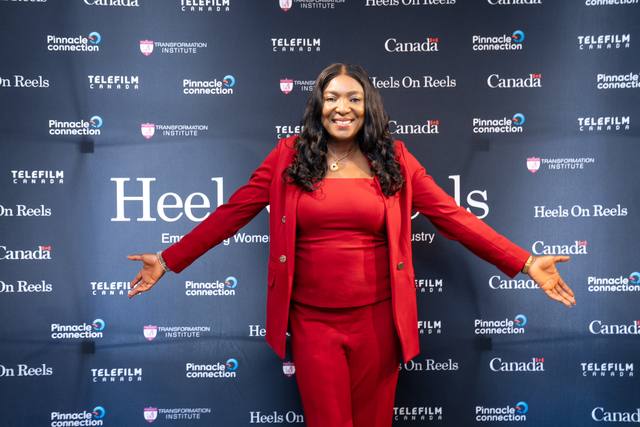 A director at the Heels On Reels backdrop